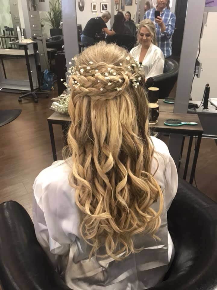 wavy hairstyle with a flower braid