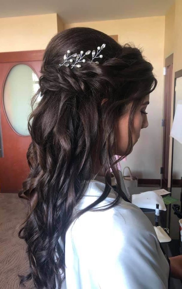 wedding hairstyle with jewels in her hair